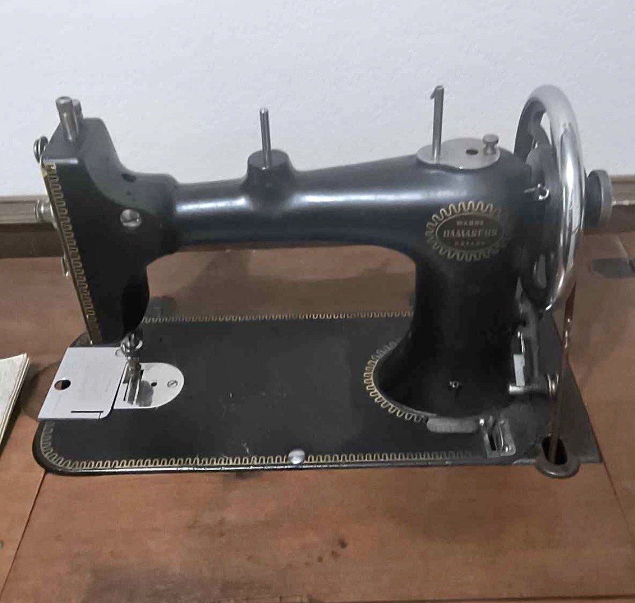 Antique Grand Damascus. Sewing Machine (1900 Series) with treadle cabinet
