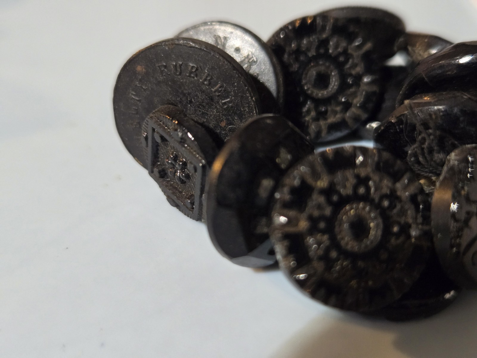 Charm String Buttons Novelty Rubber Co. Whistles Pictoral Pressed Black Glass