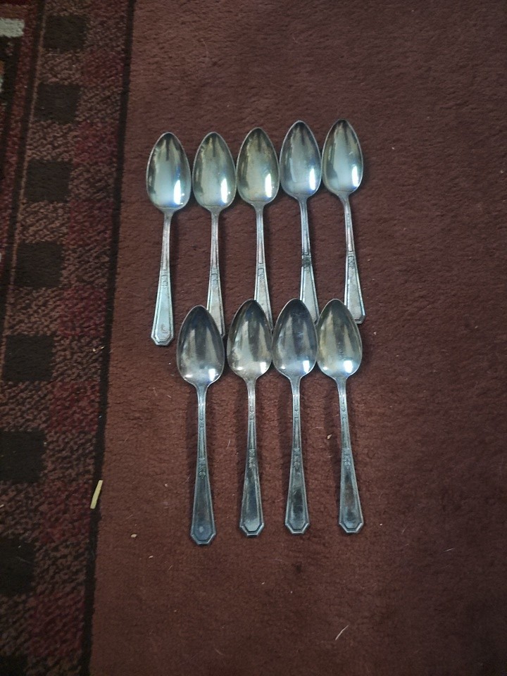 9 Identical Rogers Nickel Silver Teaspoons