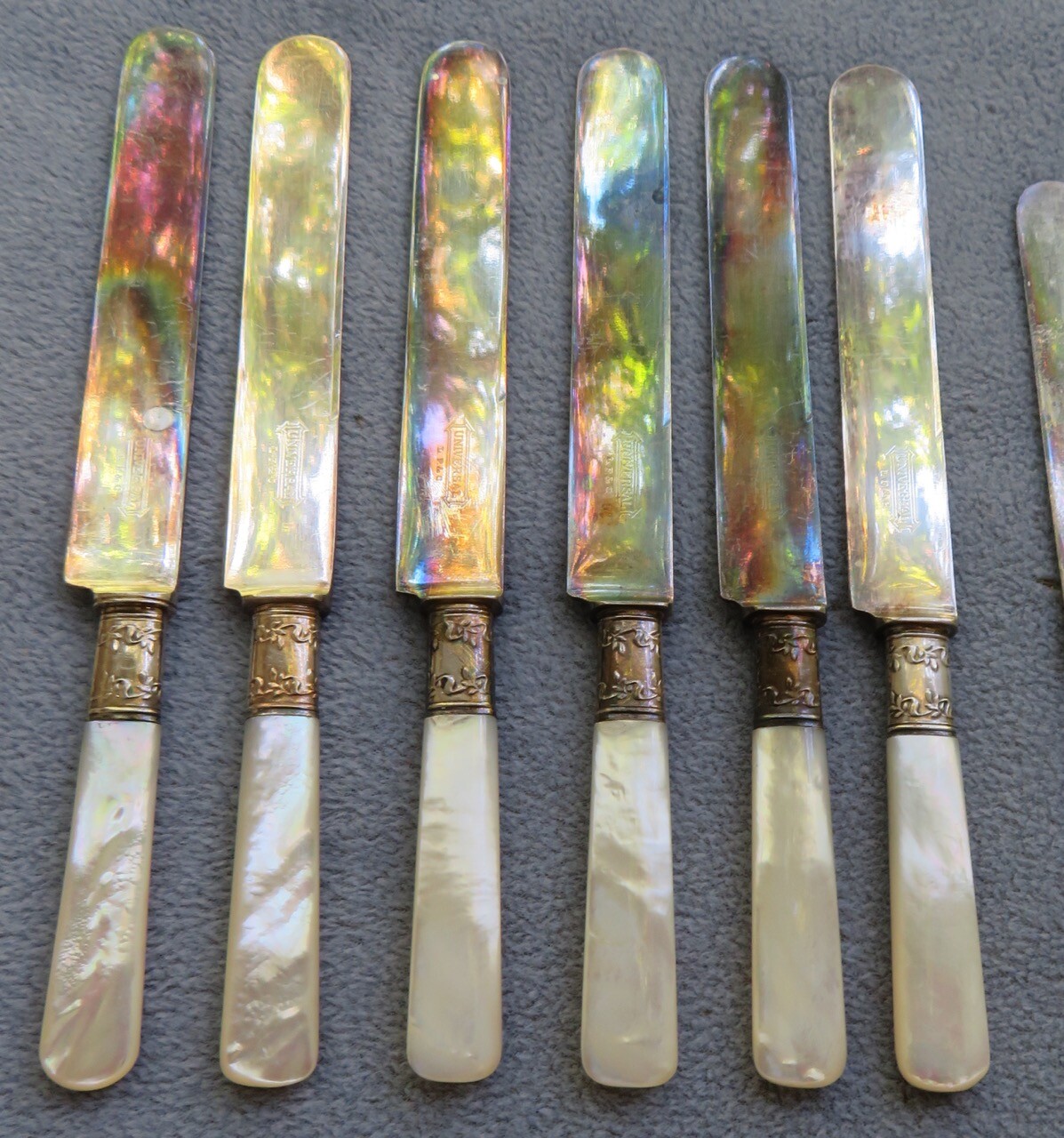 6 Landers Frary and Clark Dinner Knives Mother of Pearl Handles Sterling Bolster