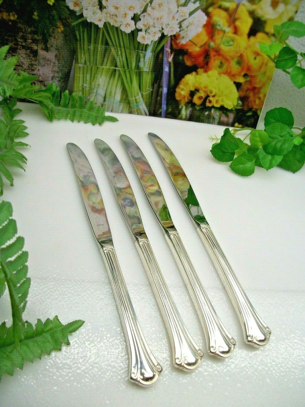 4 International Deep Silver SERENITY Silverplate Dinner Knives 1985