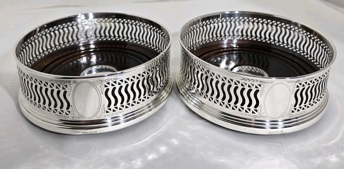 Sterling silver Wine / Spirit Bottle Coasters. Birmingham 1990. By W I Broadway