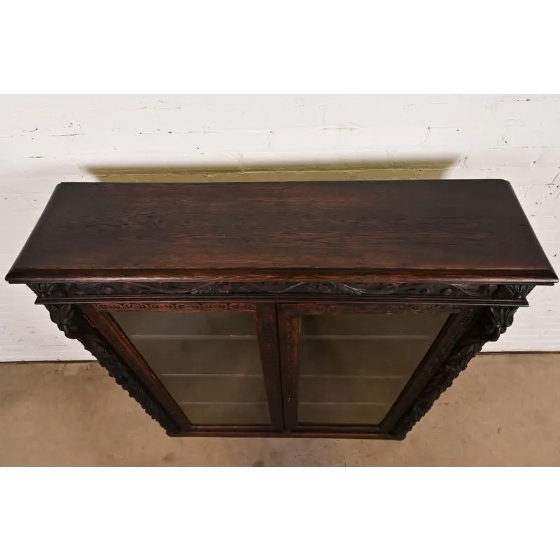 R. J. Horner Style Antique Victorian Carved Oak Bookcase Cabinet, Circa 1880s