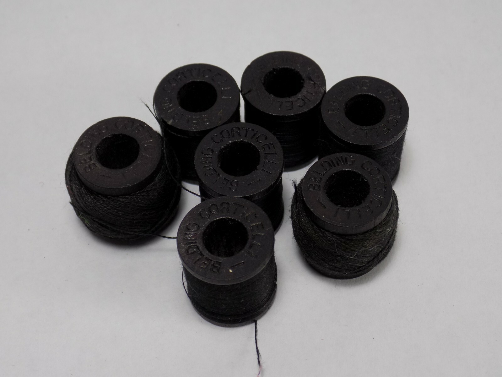 7 BELDING CORTICELLI SMALL THREAD SPOOLS 3/4″ TALL BLACK