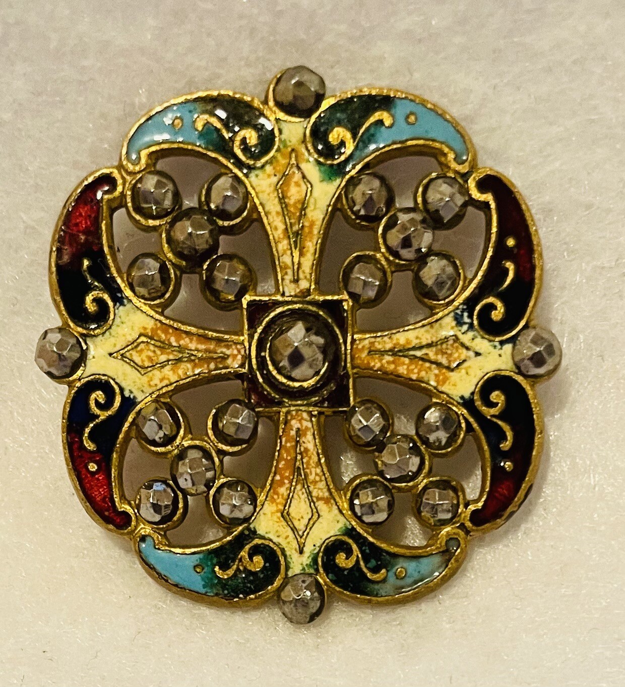 GORGEOUS ANTIQUE ONE-PIECE BRASS W/AN ENAMEL PAINTED DESIGN & CUT STEELS 1-5/16”
