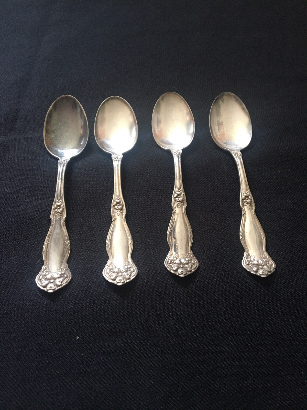 4 “Arbutus” Floral International Silver Teaspoons