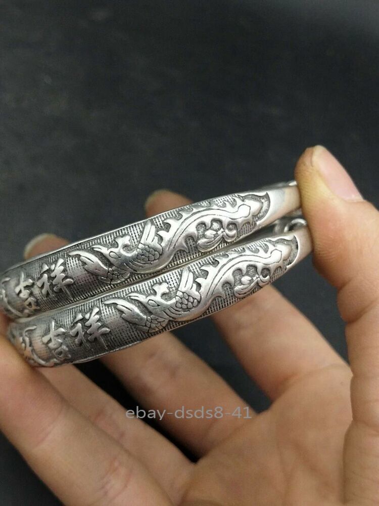 A Pair Old Chinese Tibet Silver Handcarved Dragon Phoenix Bracelets
