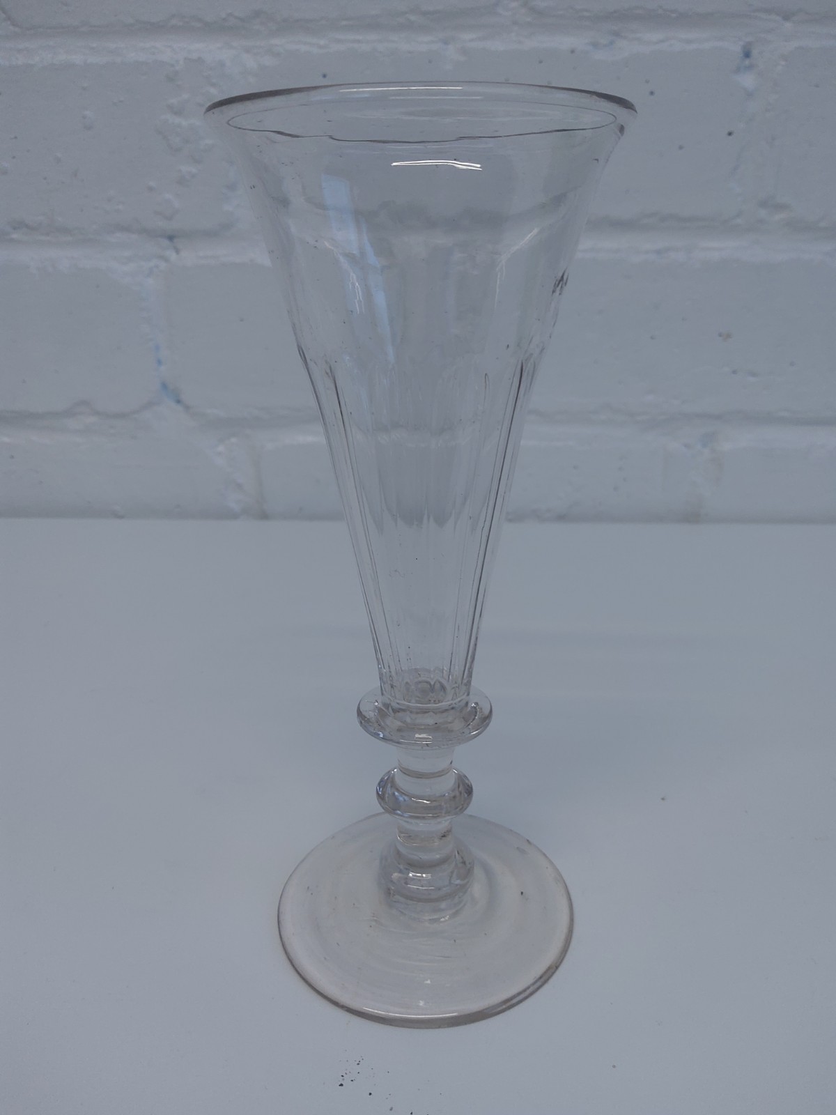 Georgian champagne glass, funnel shaped pattern bowl,snapped pontil,knop,c 1800