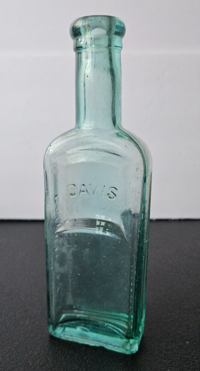 DAVIS VEGETABLE PAINKILLER. AQUA BLUE BOTTLE. SORRY DO NOT KNOW HISTORY
