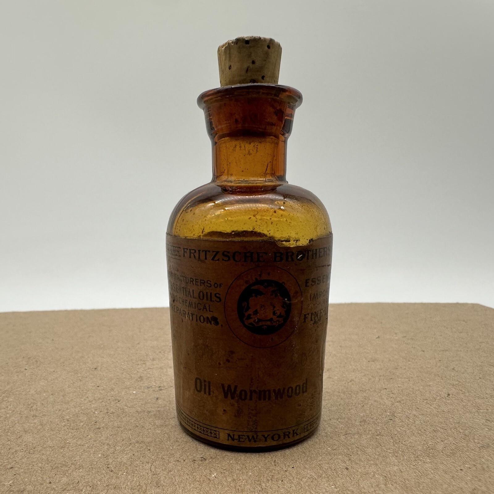Vintage FRITZSCHE BROTHERS OIL Of Wormwood MEDICINE ORIGINAL LABEL Bottle Amber