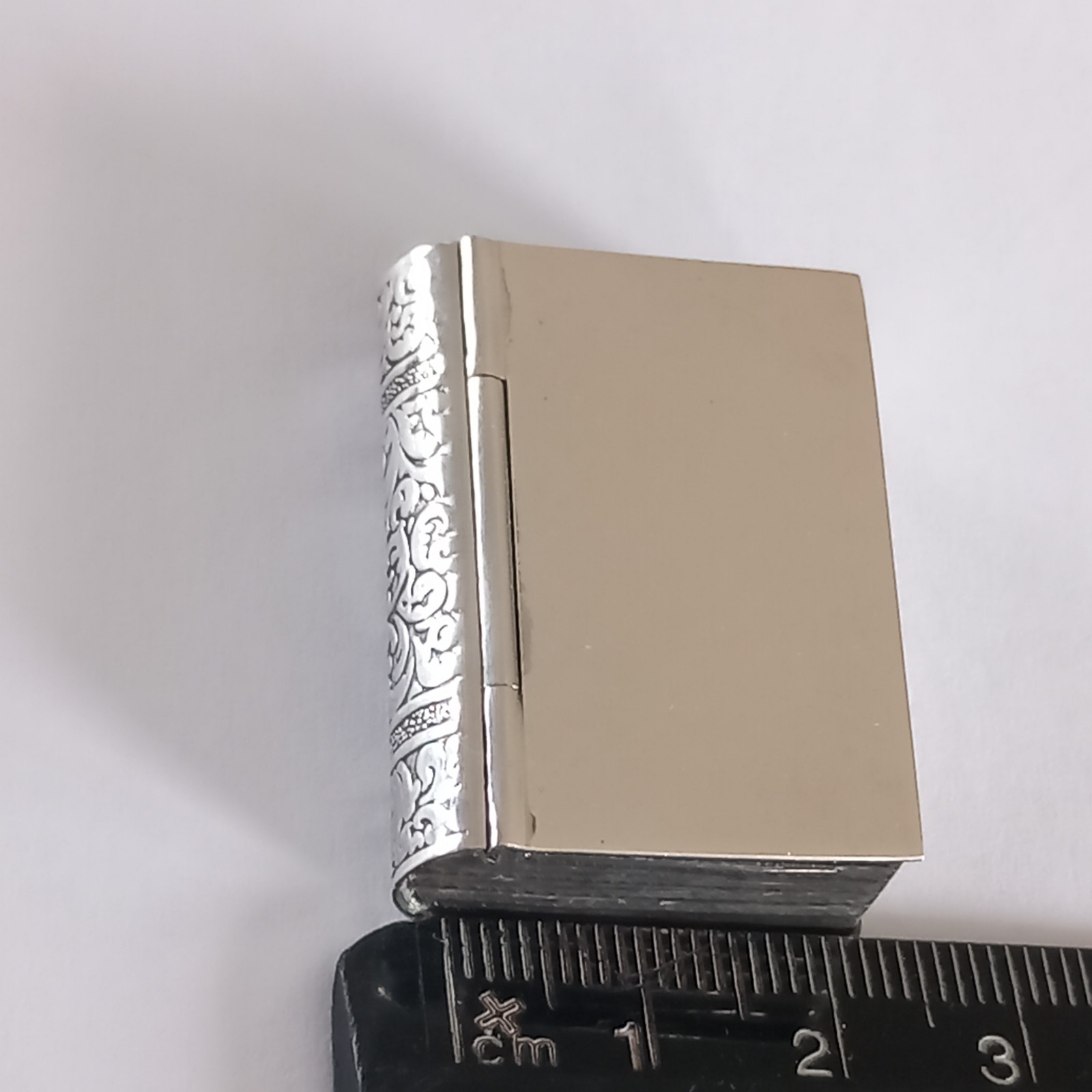 NOVELTY HALLMARKED SILVER PILL BOX IN FORM OF A BOOK.LONDON 2000. 17 grams