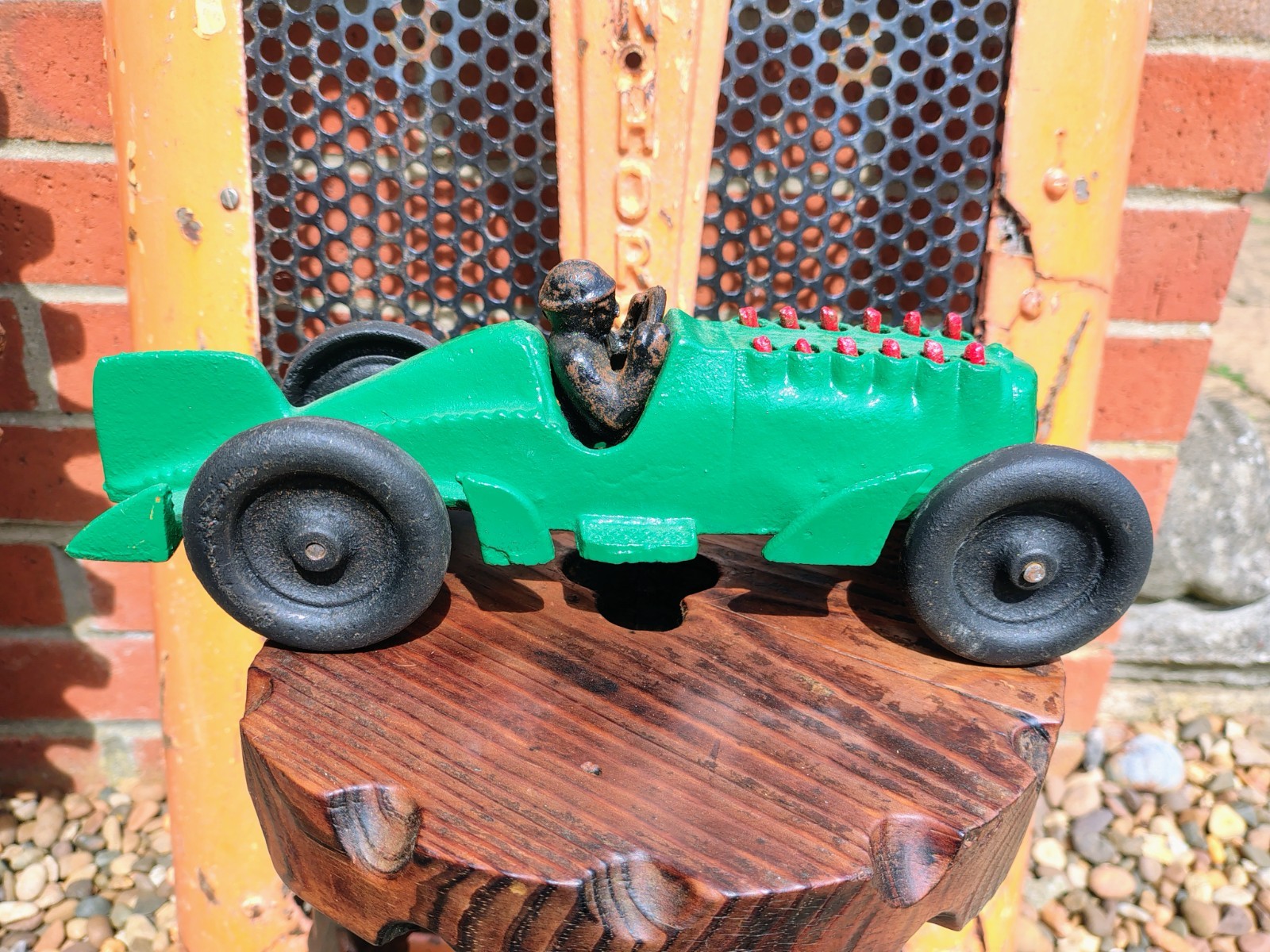 Cast Iron Piston racer car 10 inches long used , replica