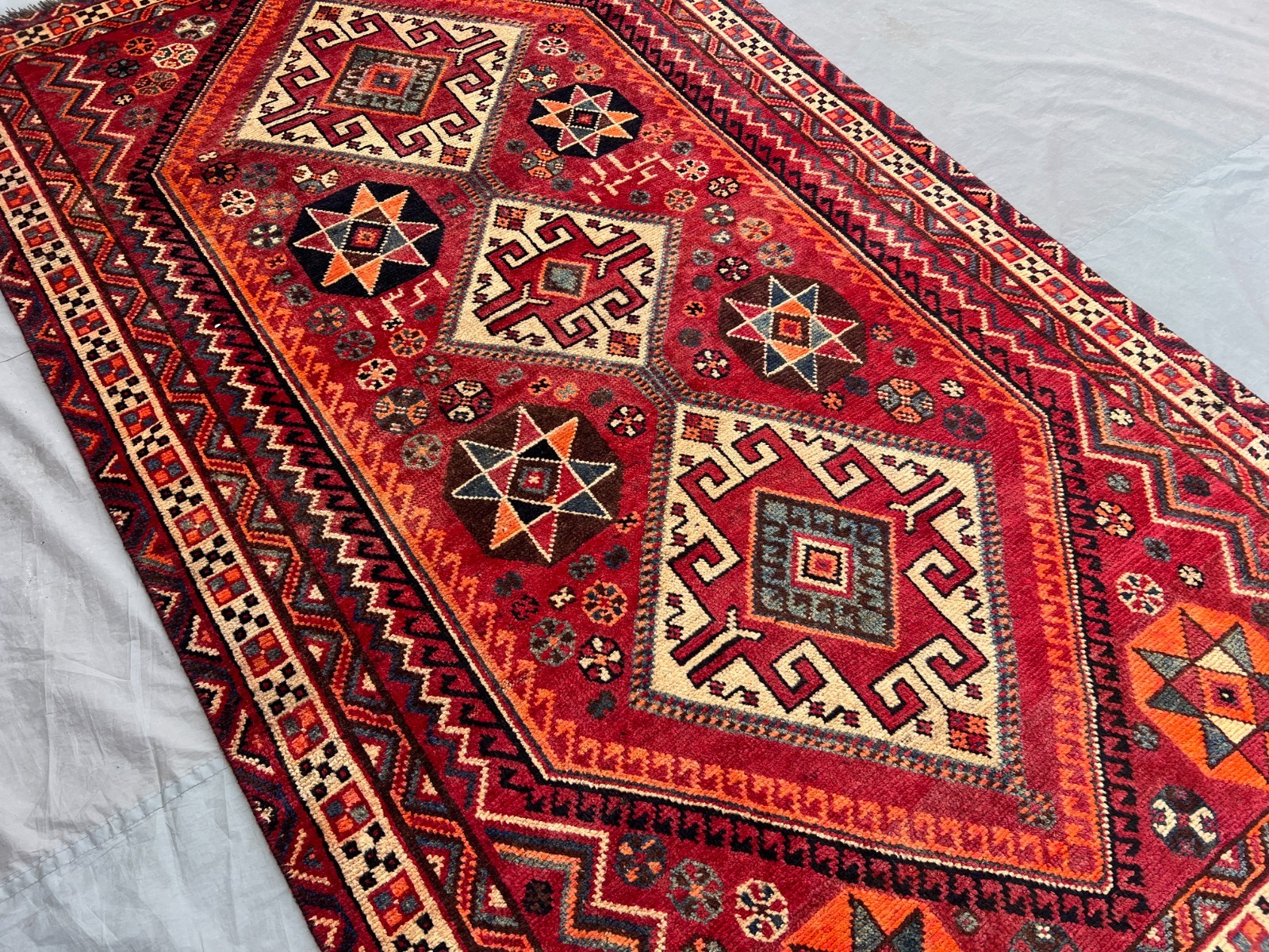 Vintage Turkish-Inspired Rug | 4’9″ x 7’10” Faded Geometric Medallion Area Rug