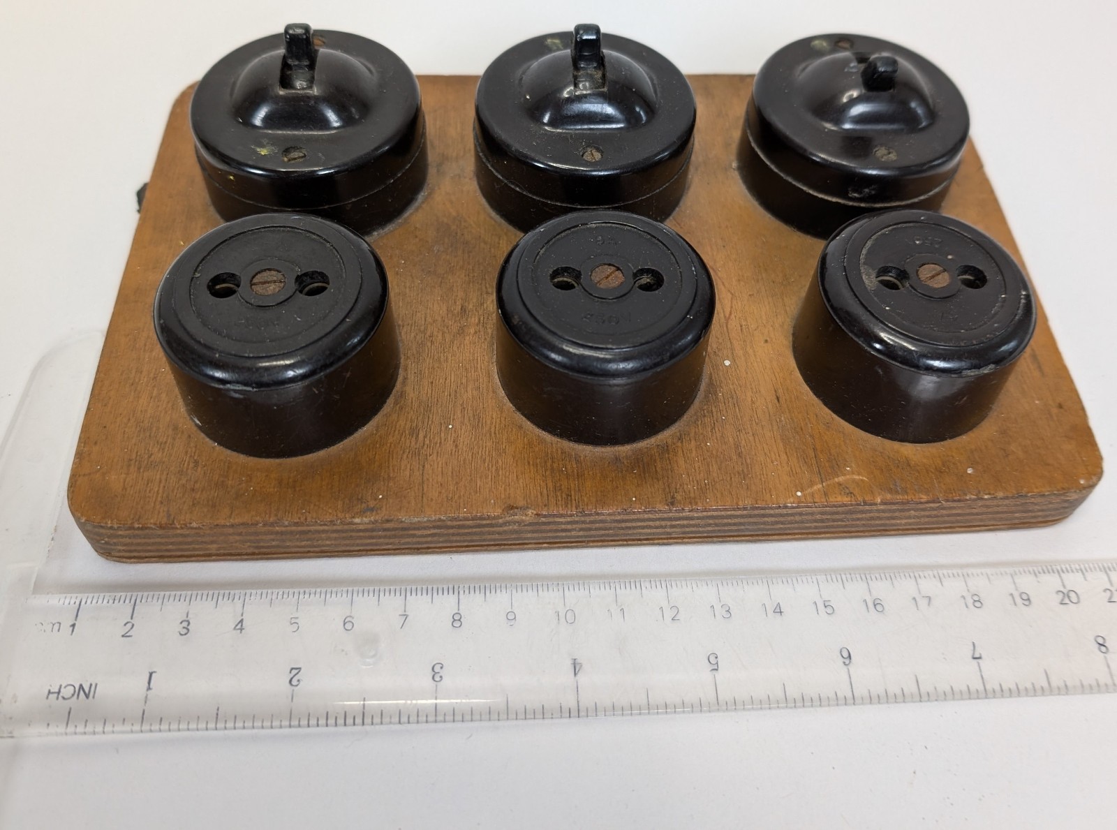 Vintage Bakelite 3 Dolly Toggle Switches And 3 Two Pin Sockets On Wooden Plinth