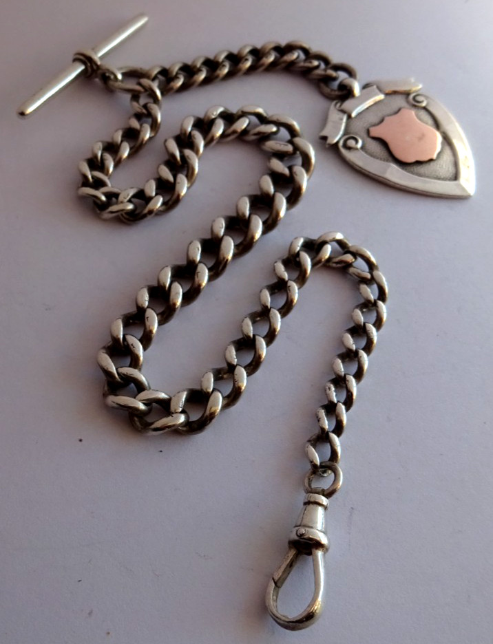 Antique solid silver pocket watch albert chain w/ silver & gold fob medal