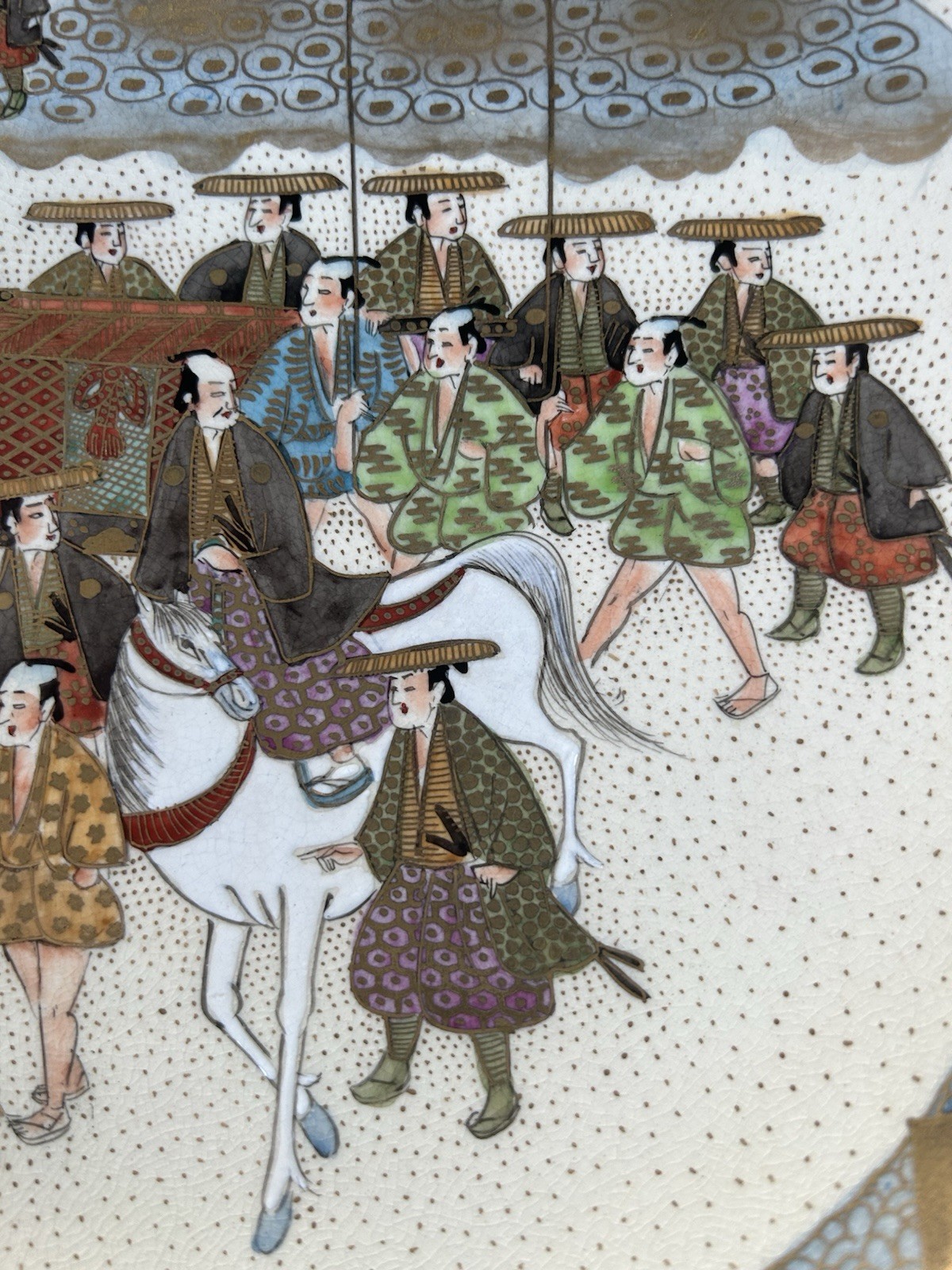 A FINE JAPANESE MEIJI PERIOD PROCESSIONAL SATSUMA PLATE