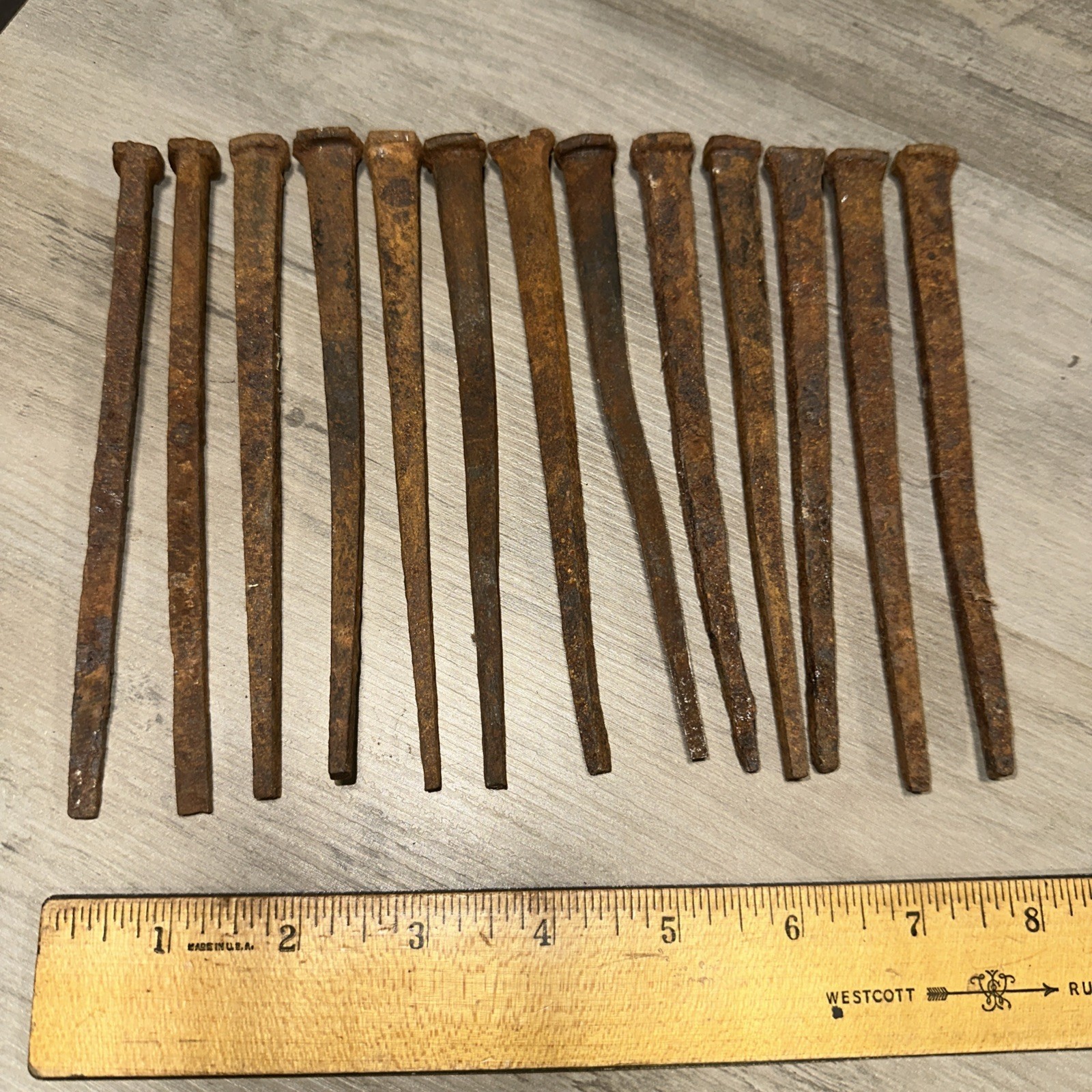 Lot of 13 Antique ~6″ long square cut nails Steel Iron Blacksmith Rustic