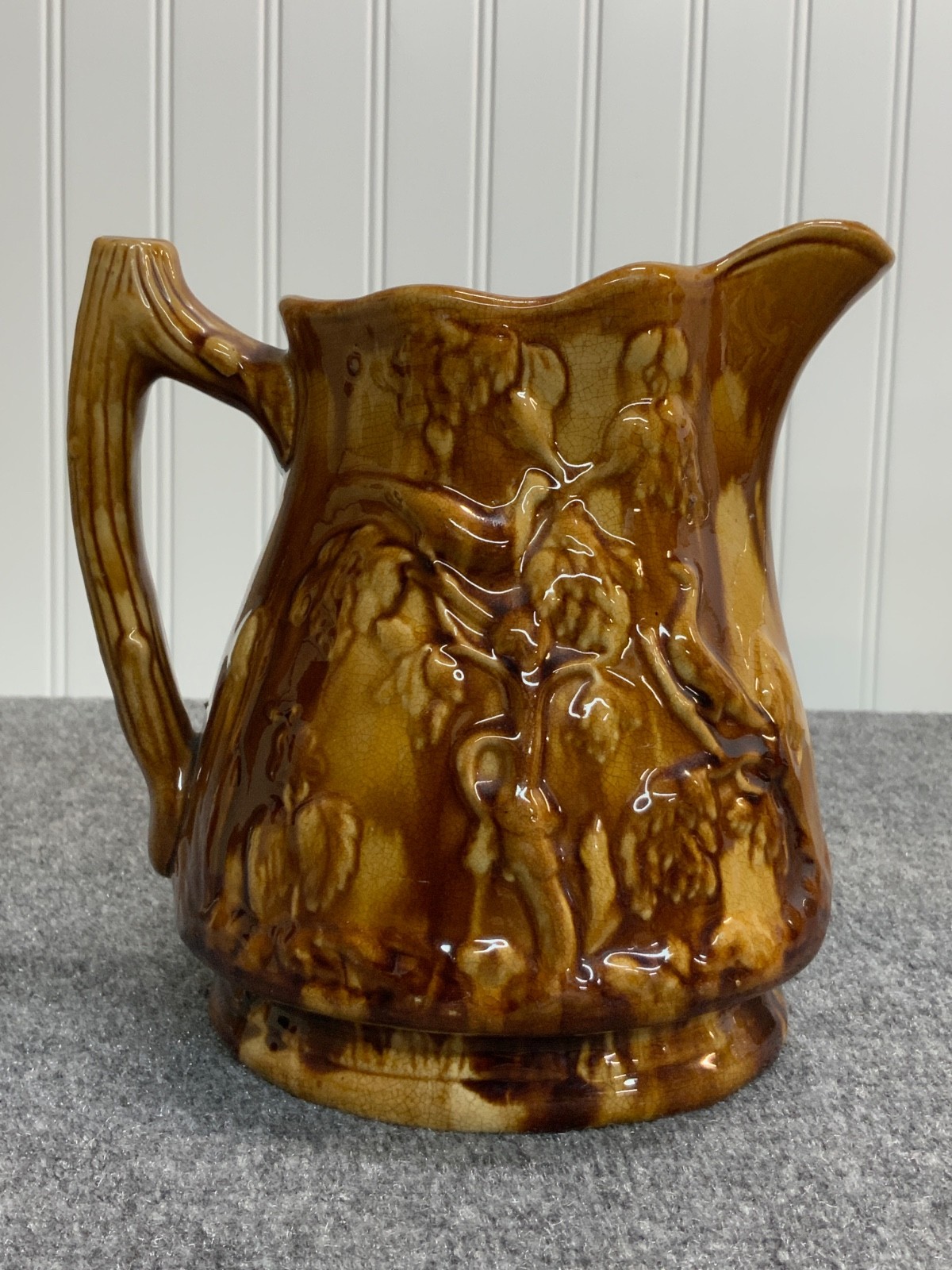 “Rockingham” Glaze Pitcher, “The Hunter”