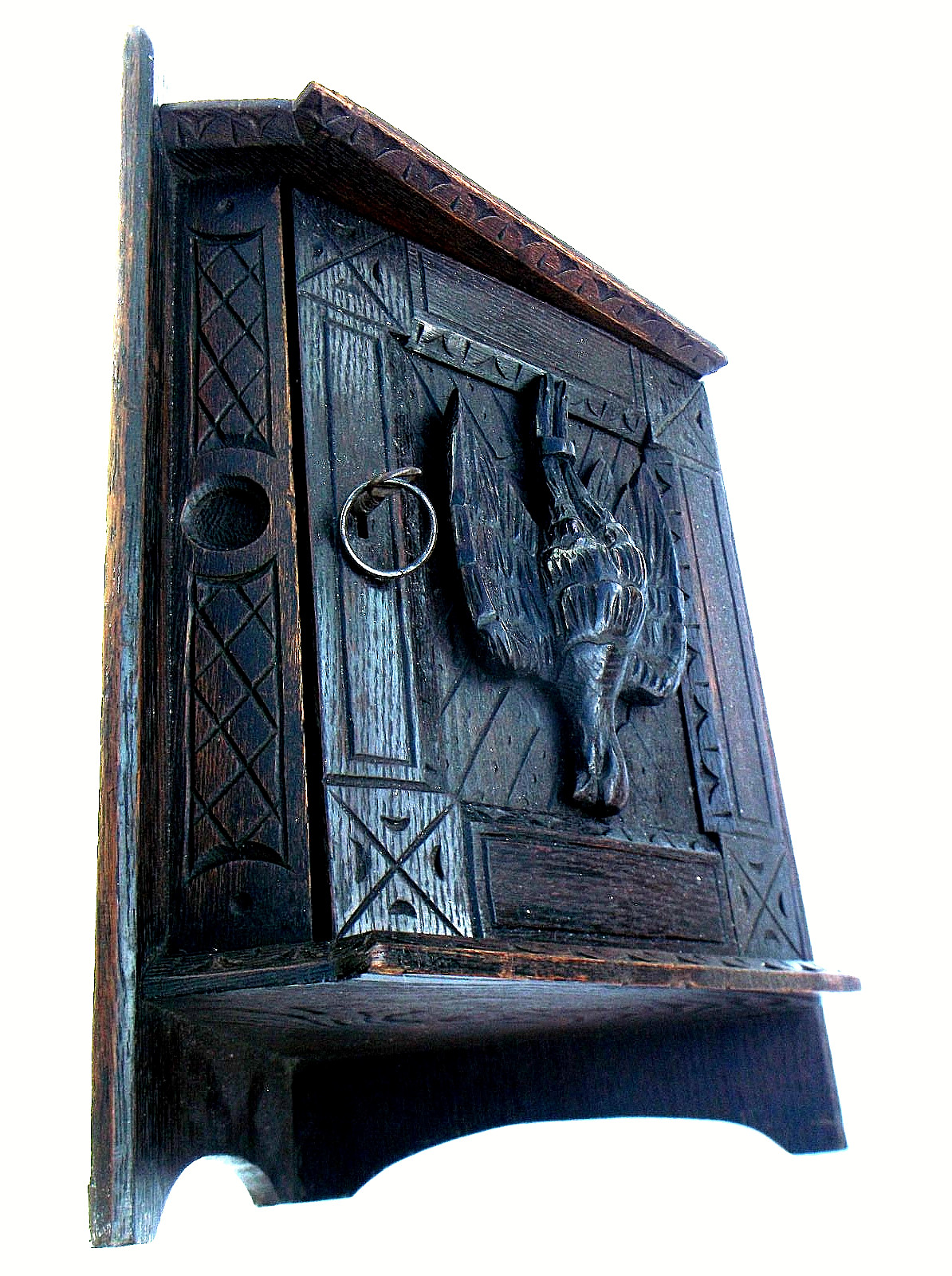 A RARE ANTIQUE OAK CORNER CABINET WITH A CARVED DEAD GAME BIRD ON THE FRONT DOOR