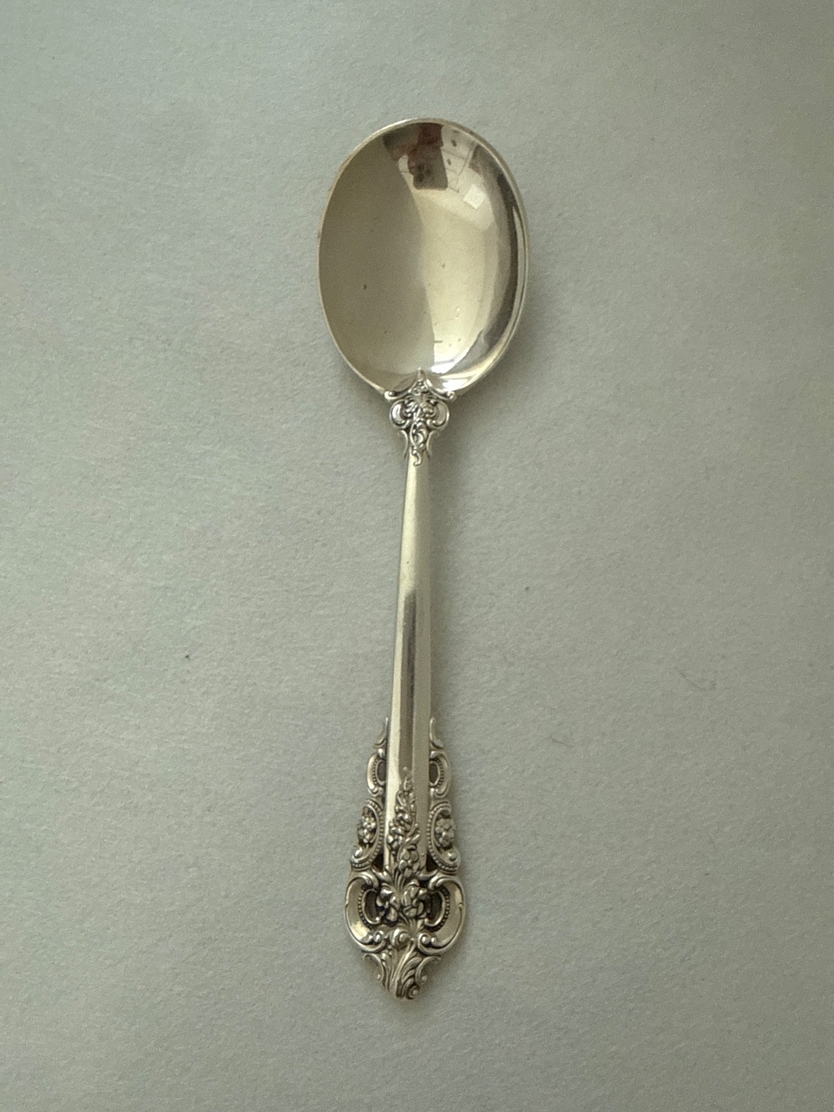 Wallace Grande Baroque Sterling Cream Soup Spoon. No mono. 6 1/8″. Priced per