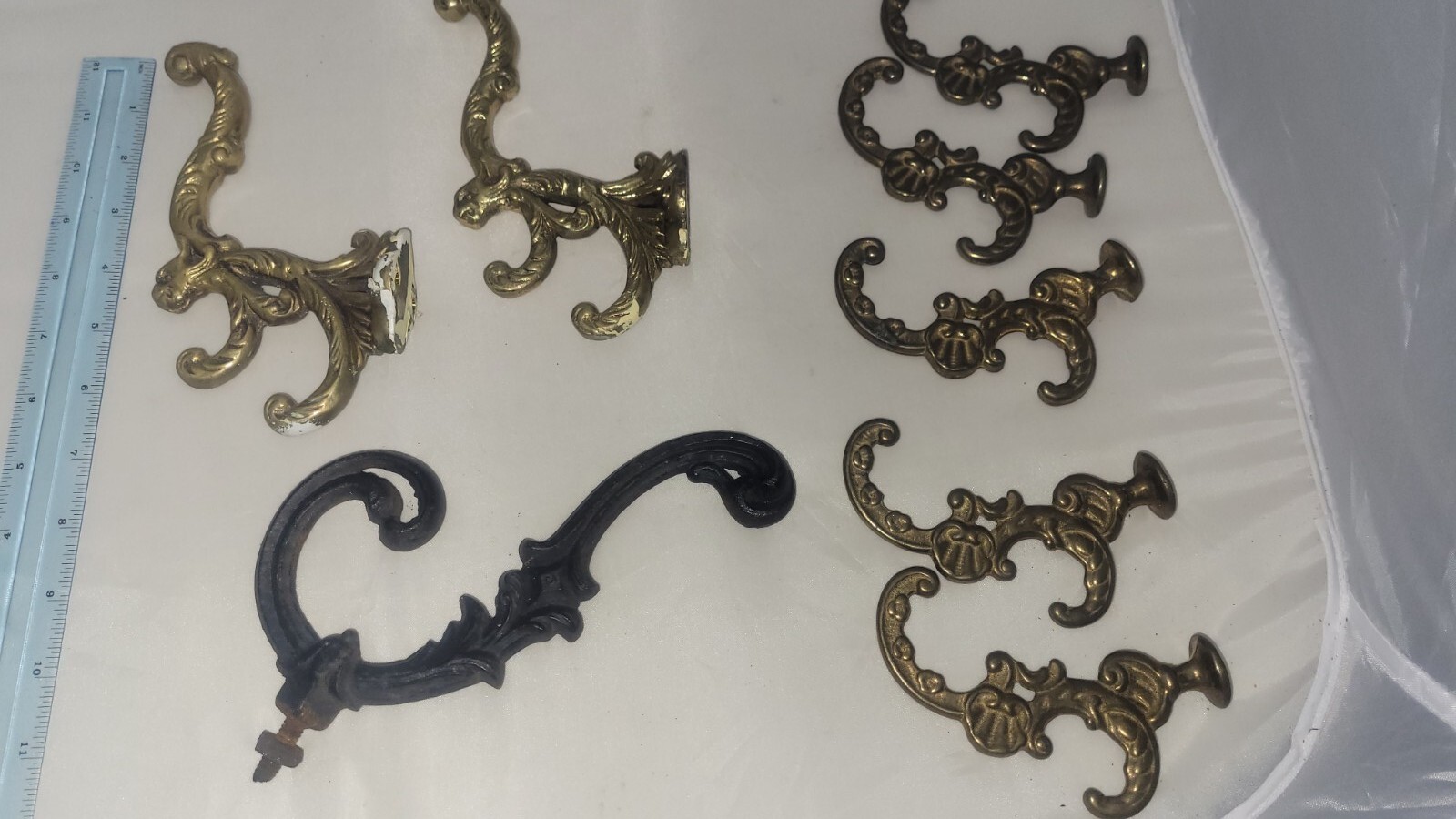 GROUP of 8 ANTIQUE CAST IRON BRASS COAT RACK HOOKS 2 WITH LION HEADS
