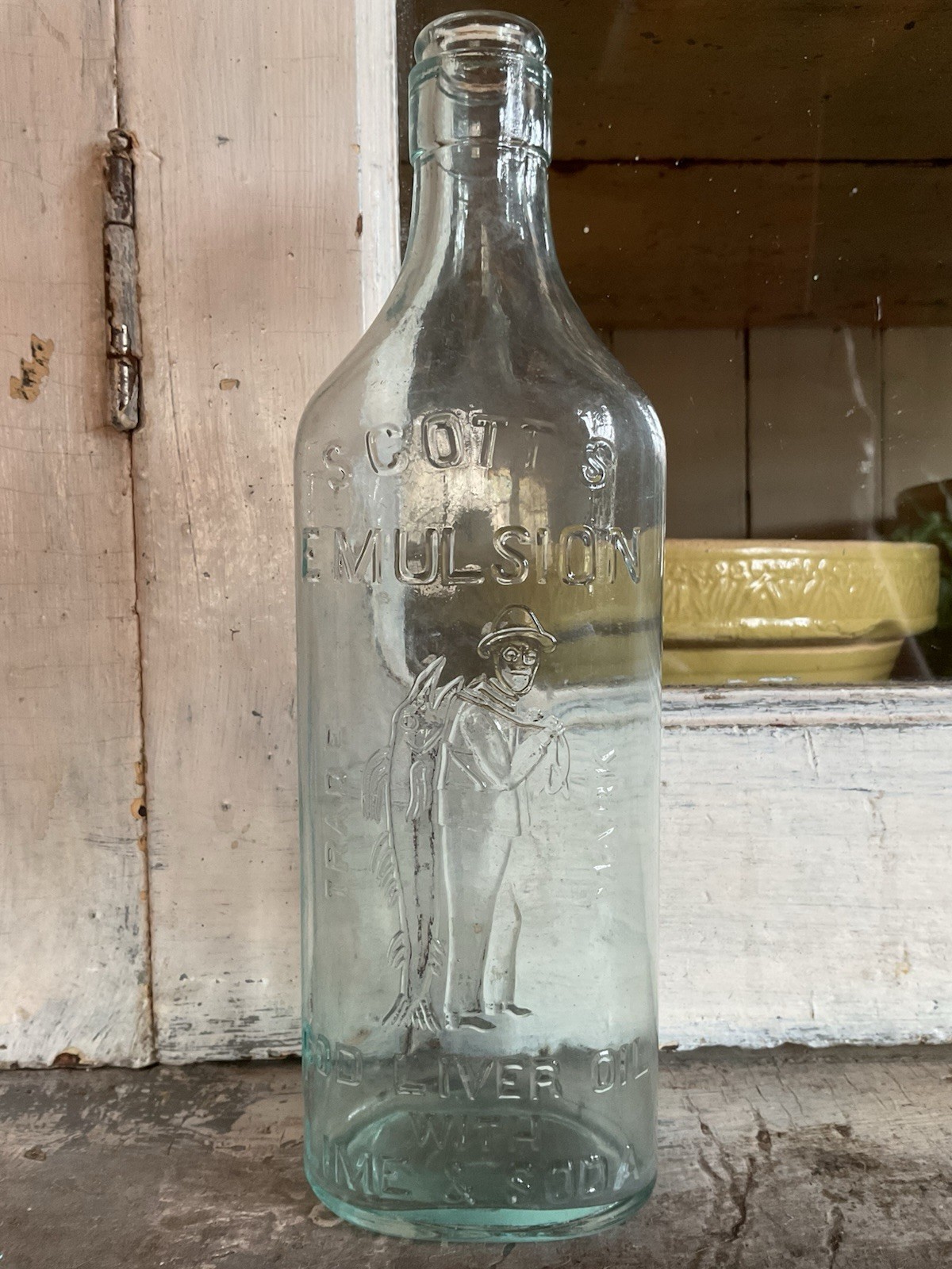Antique Aqua Blue Fisherman Scott’s Emulsion COD Liver Oil With Lime Soda Bottle