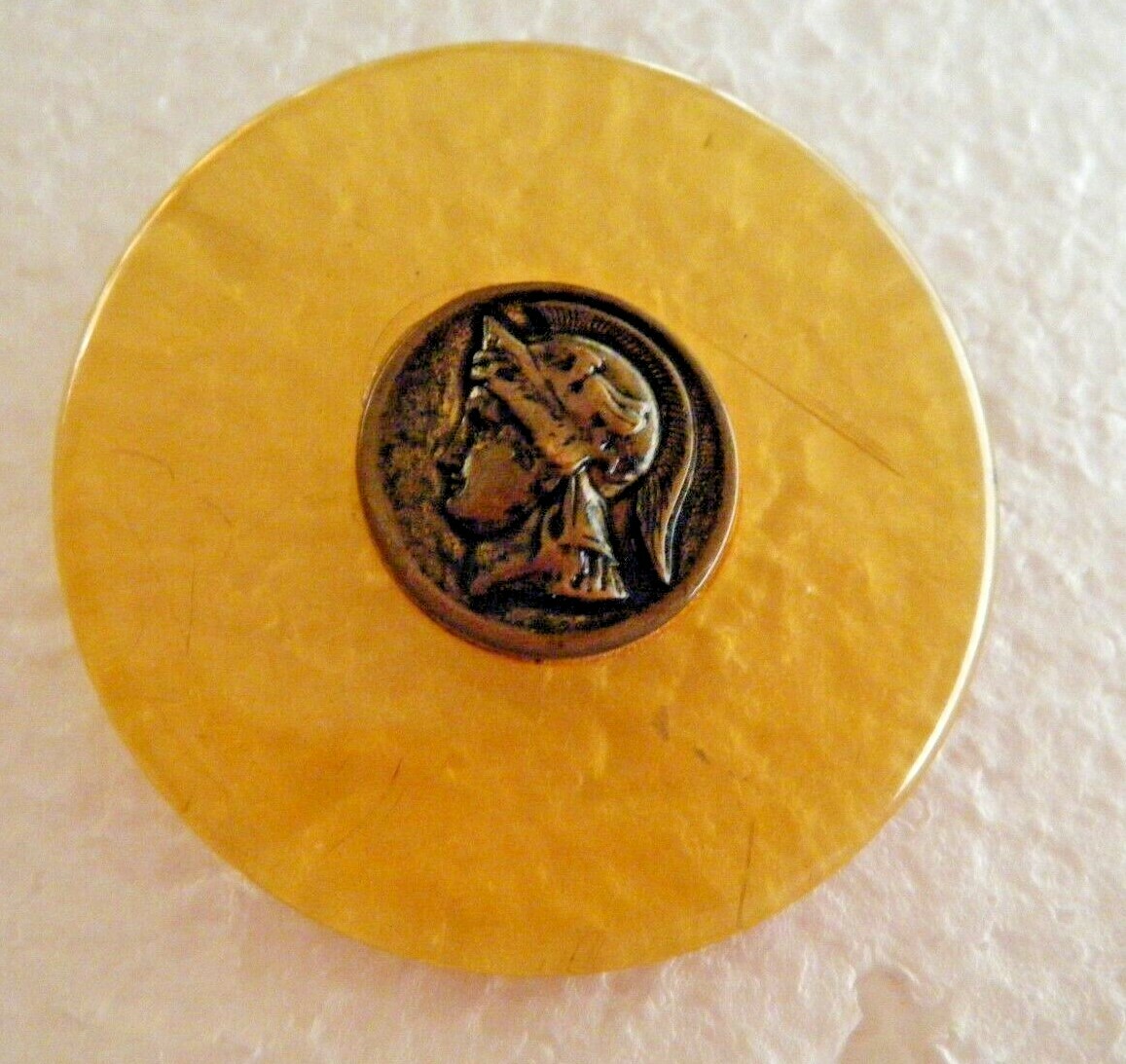 Vtg picture button Apple Juice Bakelite amber color w brass button warrior 2″