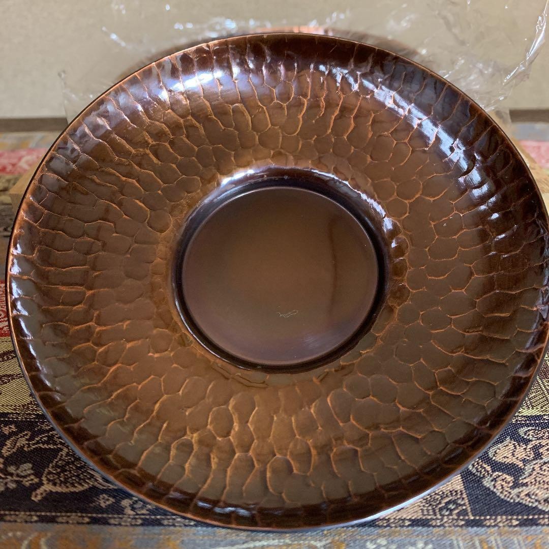 Copper tea coaster. Traditional craft.