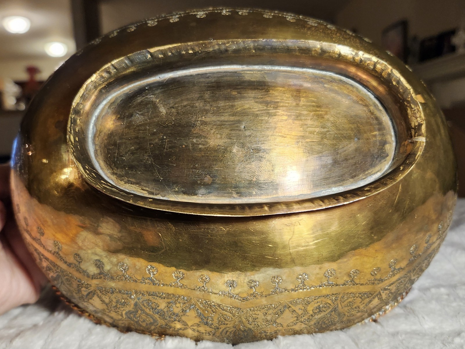 Antique Middle Eastern brass decorative set with engraved floral motifs.