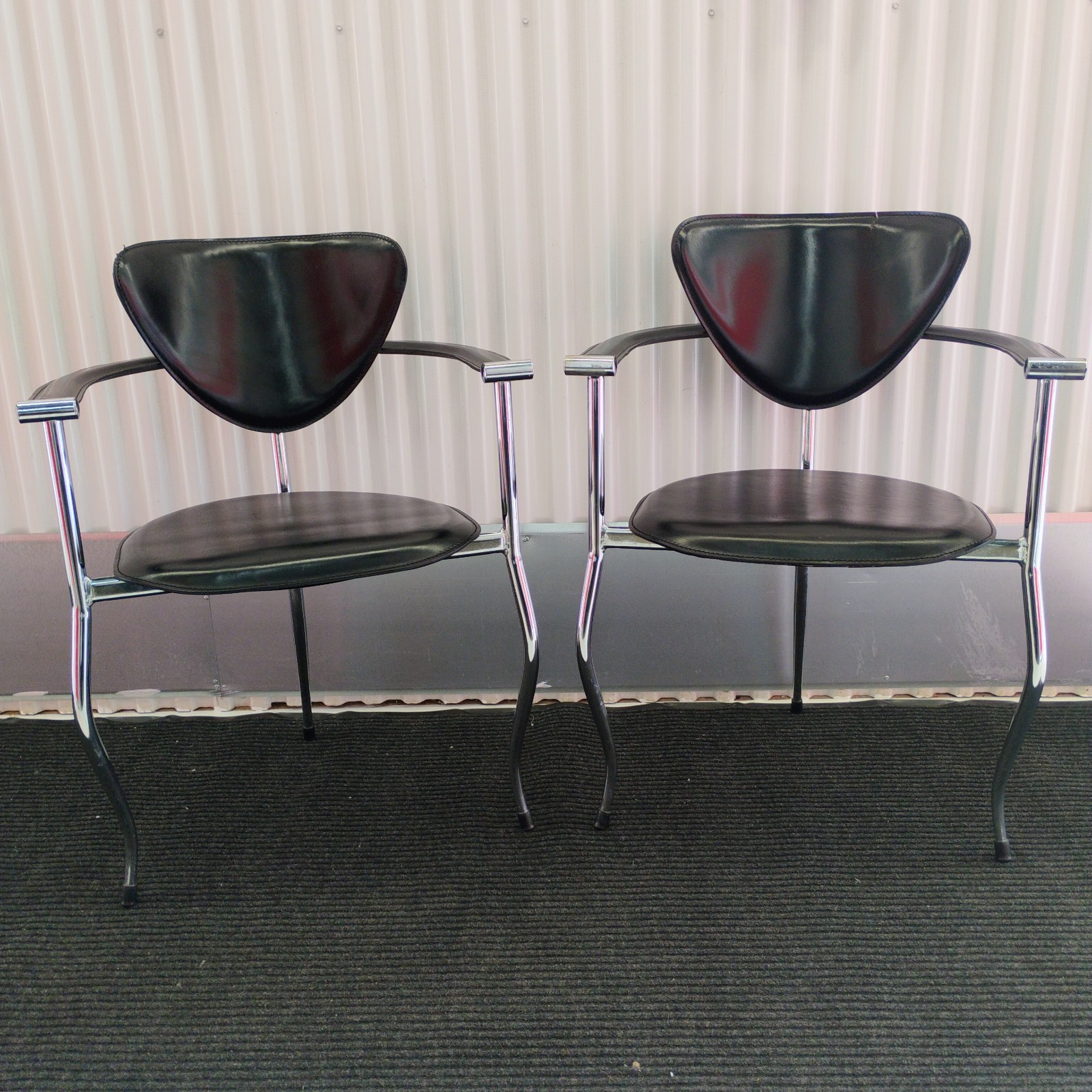Pair Of Italian Black Leather Stiletto Chairs by Arrben