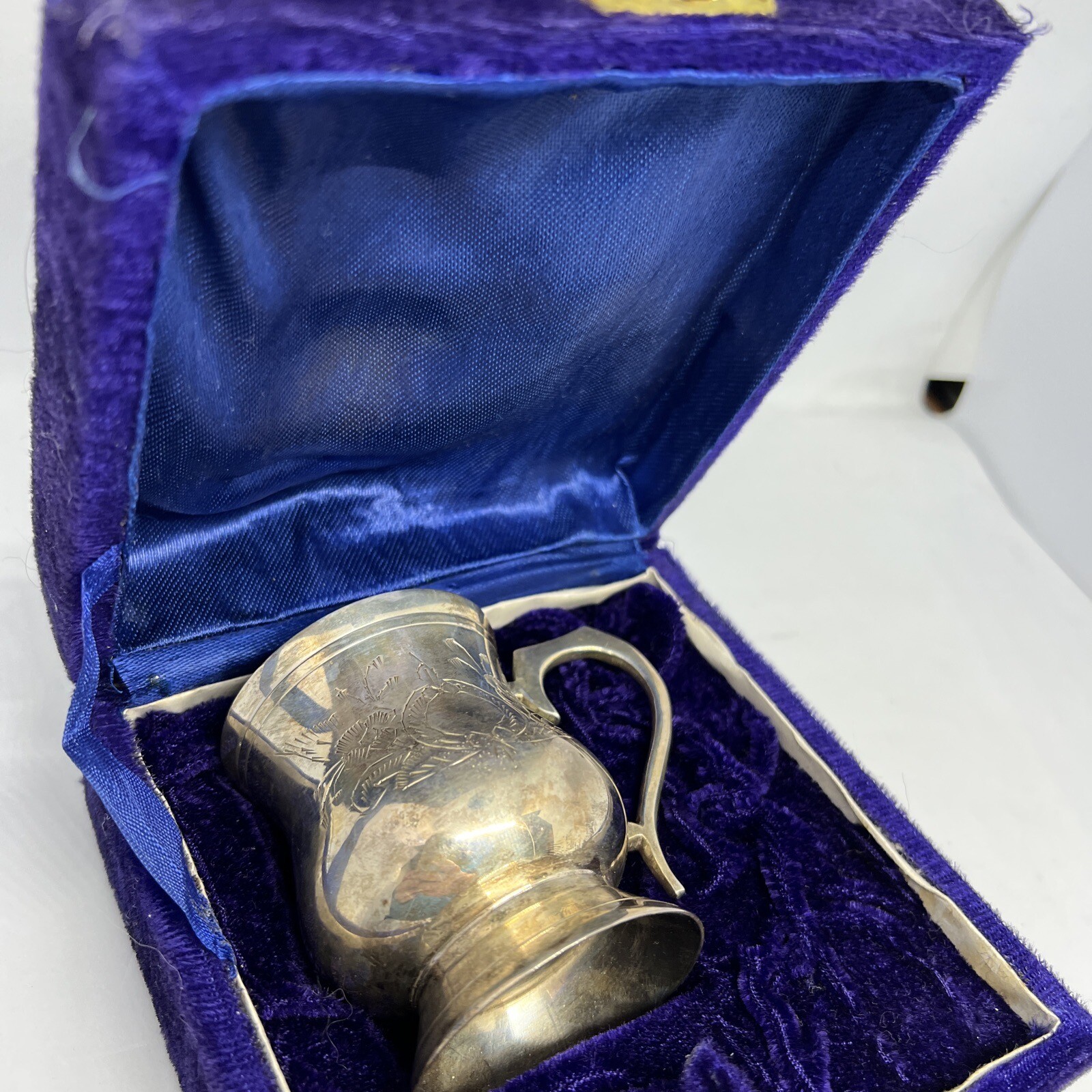 Antique Miniature Silver Cup in velvet blue box etched with flowers. Pre-loved