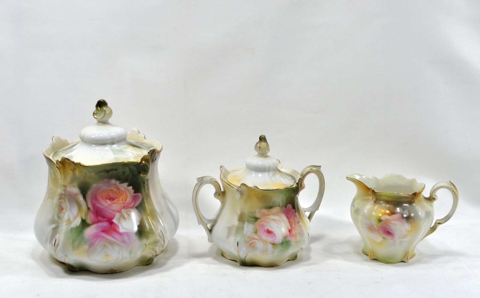 Prussia 1900 “Pink Roses” floral pot, sugar bowl and creamer