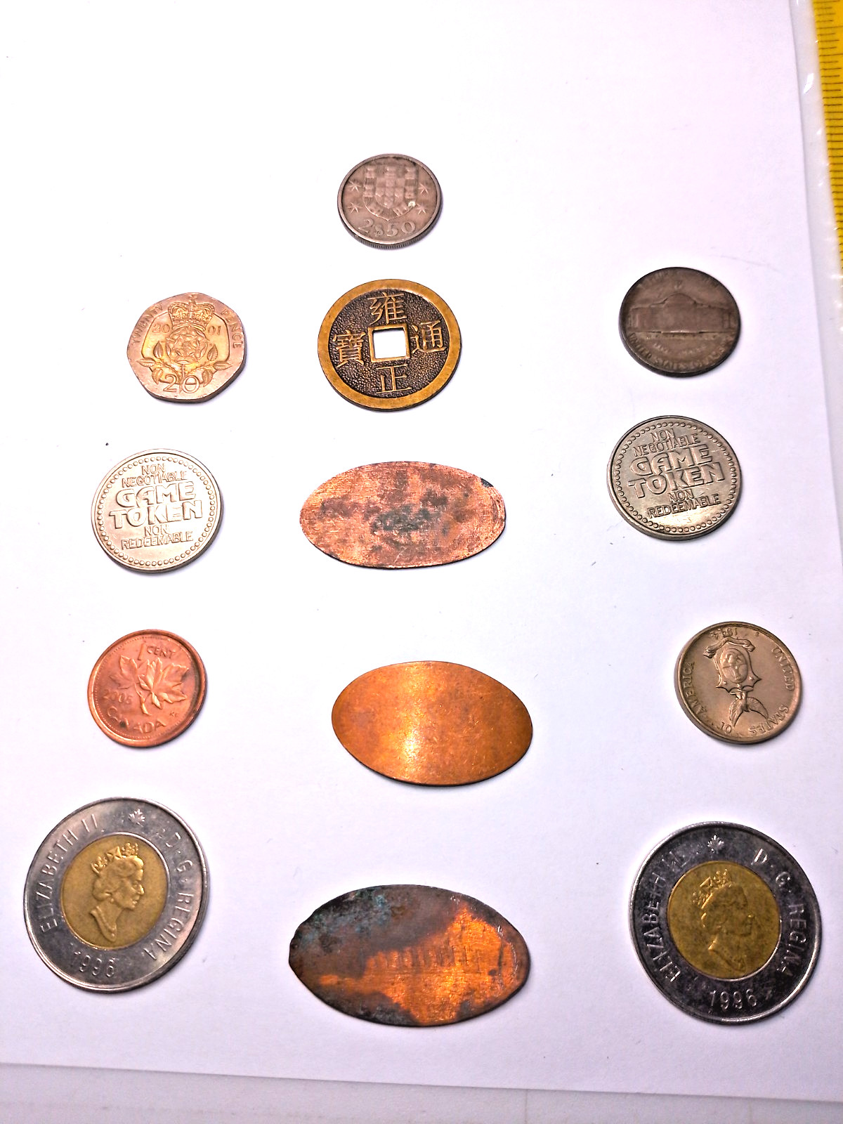 Assorted lot coins stretch pennies tokens as seen