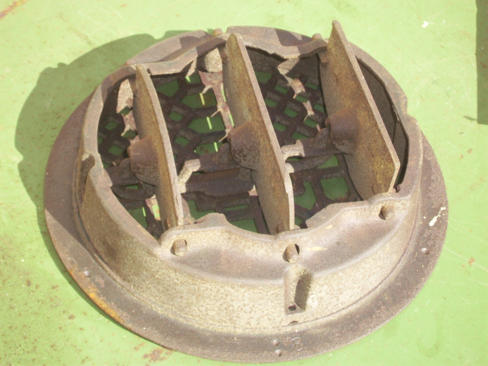 Vintage round 7 1/2 by 9 1/2 cast iron floor heater grate, adjustable louvers