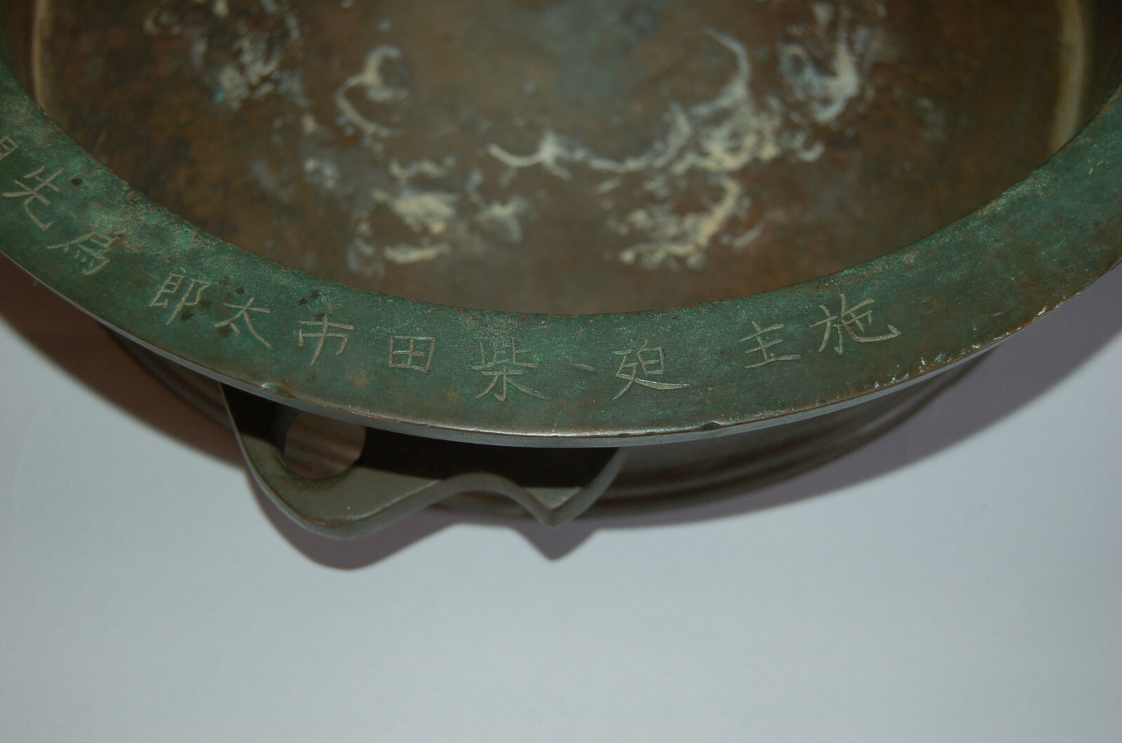 Yellow bronze brass cylindrical musical gong, kane, Zenshoji temple, Japan