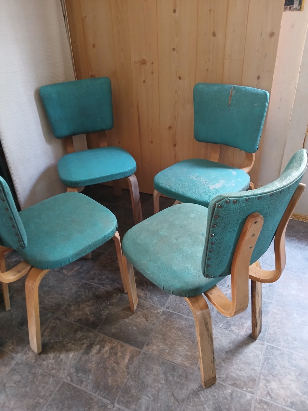 Vintage bent wood chairs with beautiful vynl seat and back cushions.