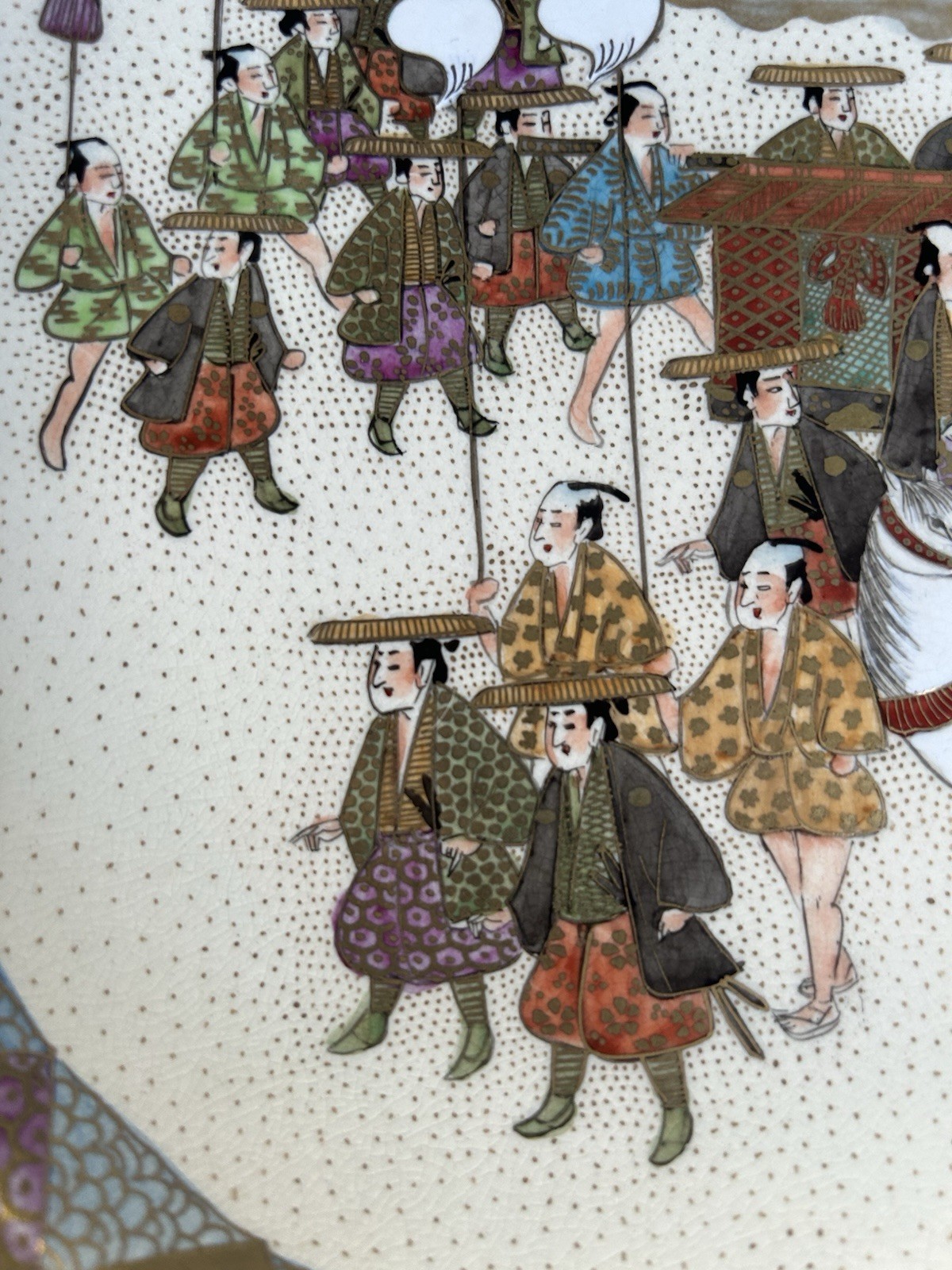 A FINE JAPANESE MEIJI PERIOD PROCESSIONAL SATSUMA PLATE