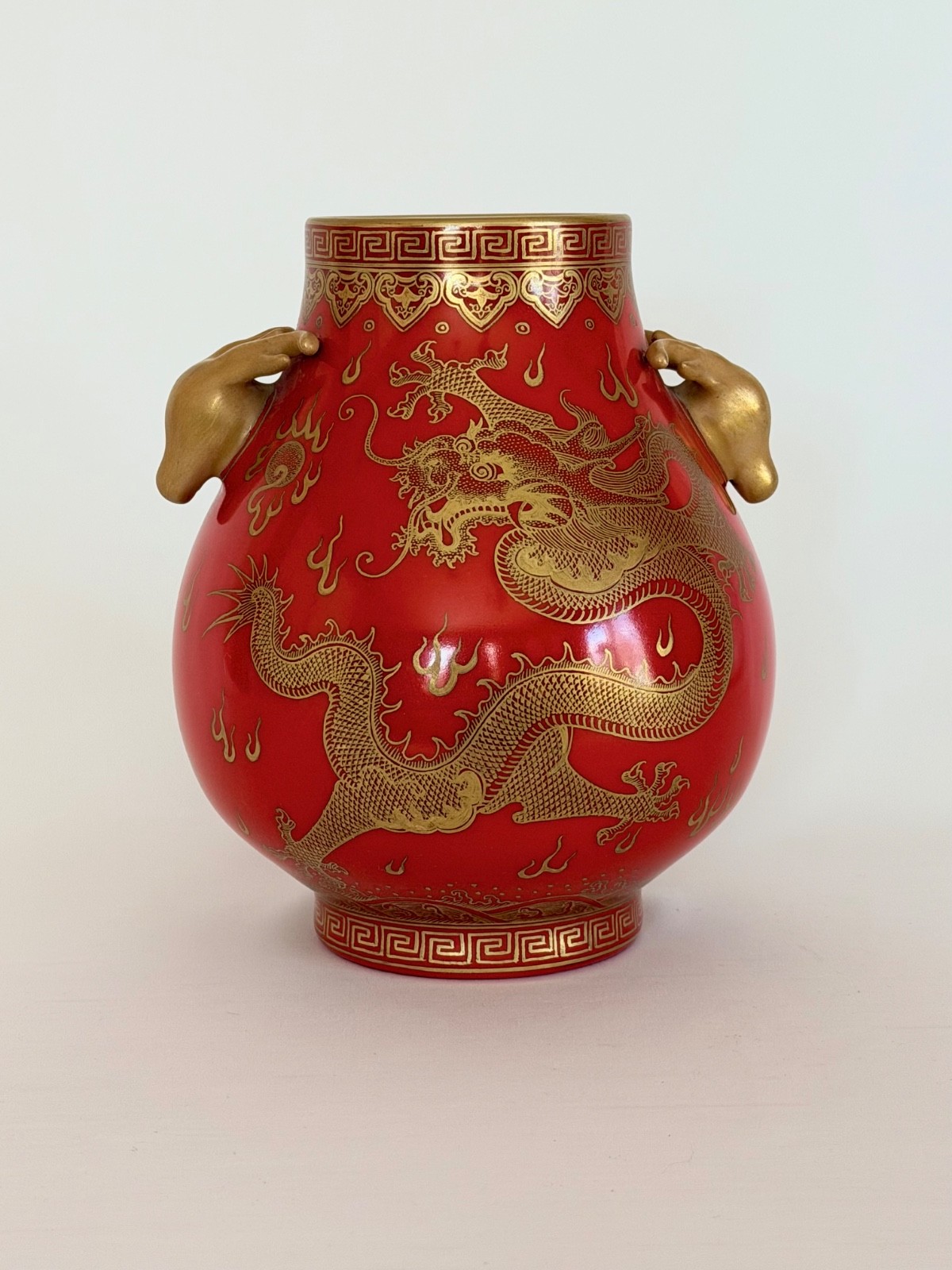 Red and gold dragon phoenix vase with sculpted deer head handles and seal mark