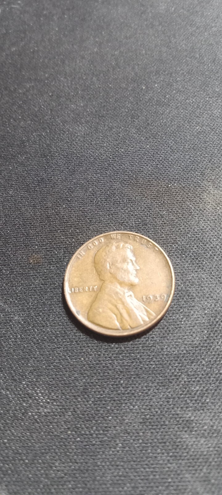 1939 no mint wheat penny–error (L on rim)