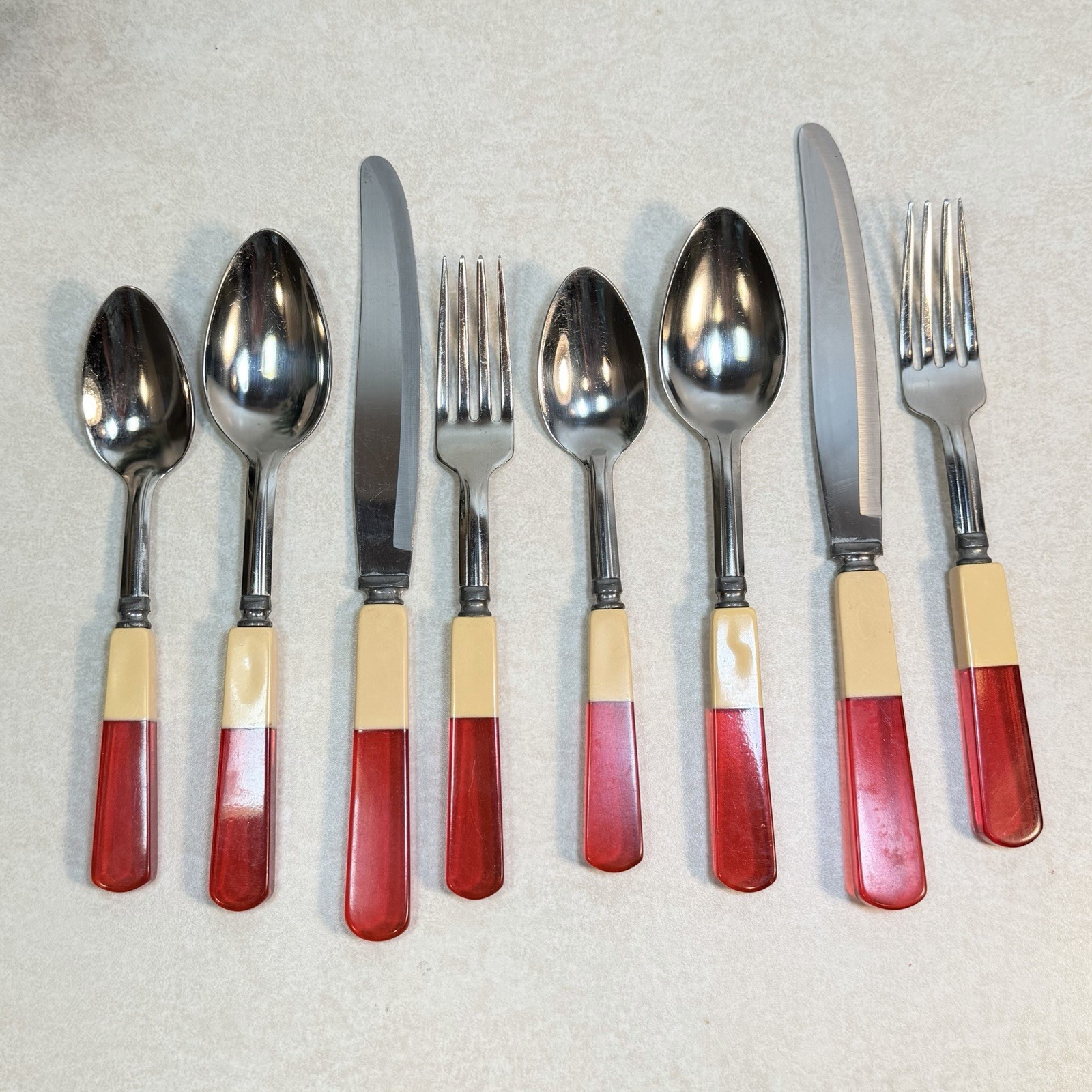 8 Piece Lucite Cherry Bakelite Butterscotch Handle Art Deco Stainless Flatware