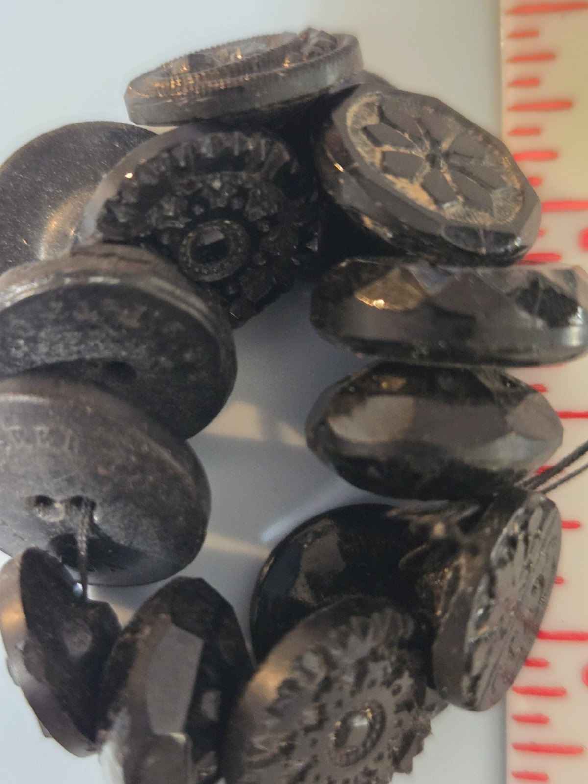 Charm String Buttons Novelty Rubber Co. Whistles Pictoral Pressed Black Glass