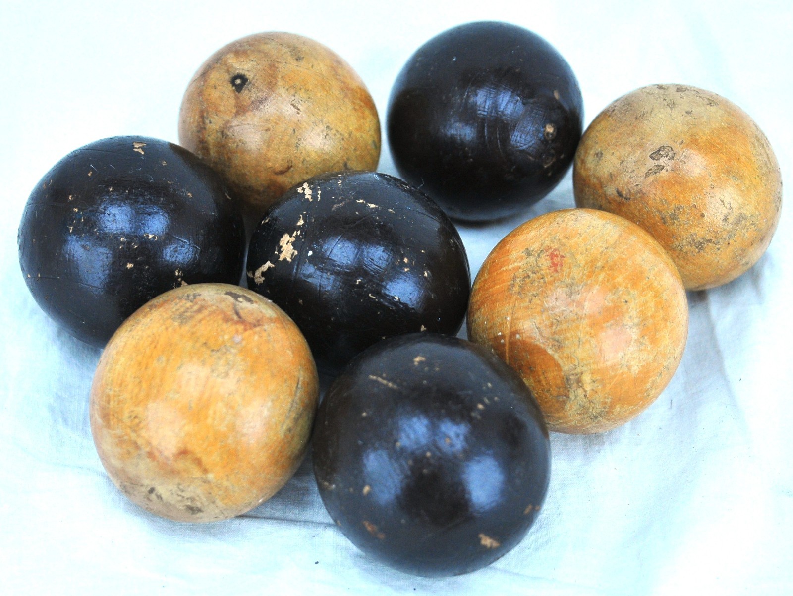 Antique Wooden Bias Carpet Bowls • Set of 8 • 4 Black 4 Natural • c1900