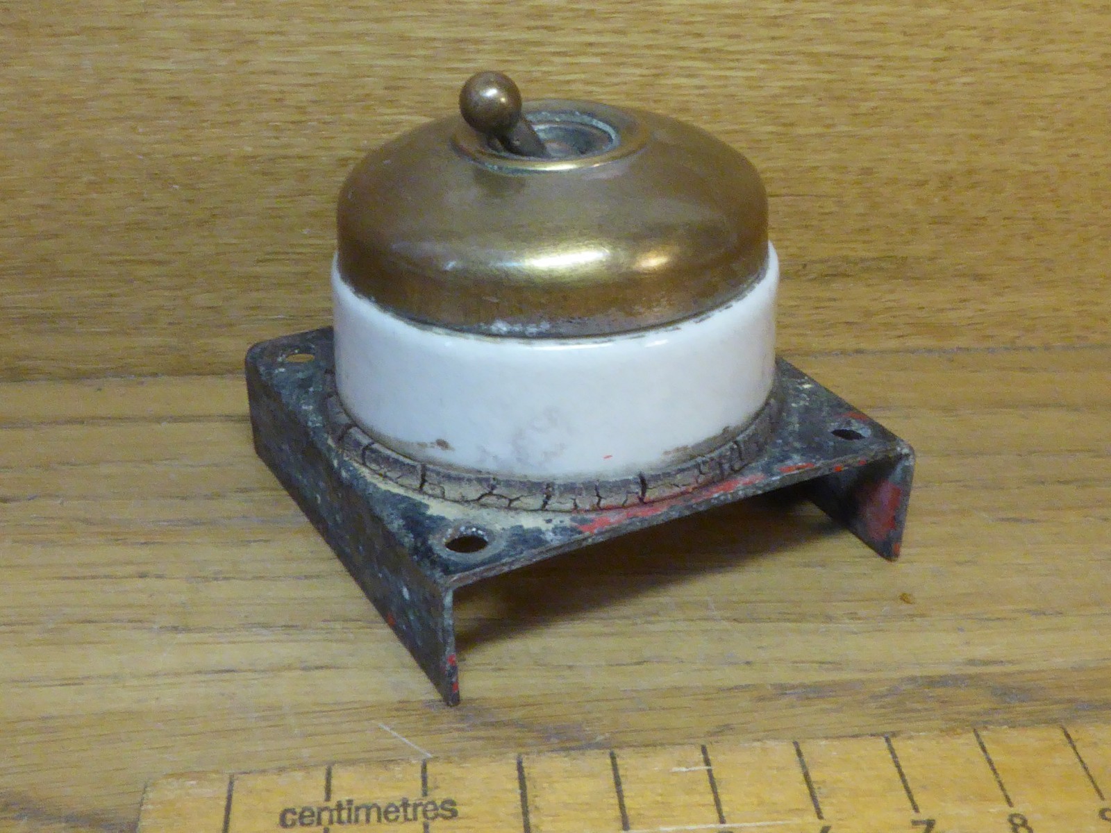 Antique Crabtree Ceramic Dolly Switch with Brass cover.Single gang light switch