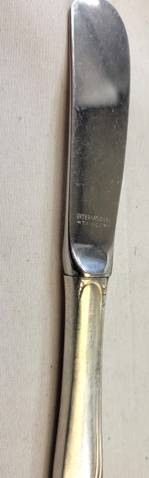 “Spring Glory” Flat Solid Butter Spreader Knife-5 3/4″ International Sterling