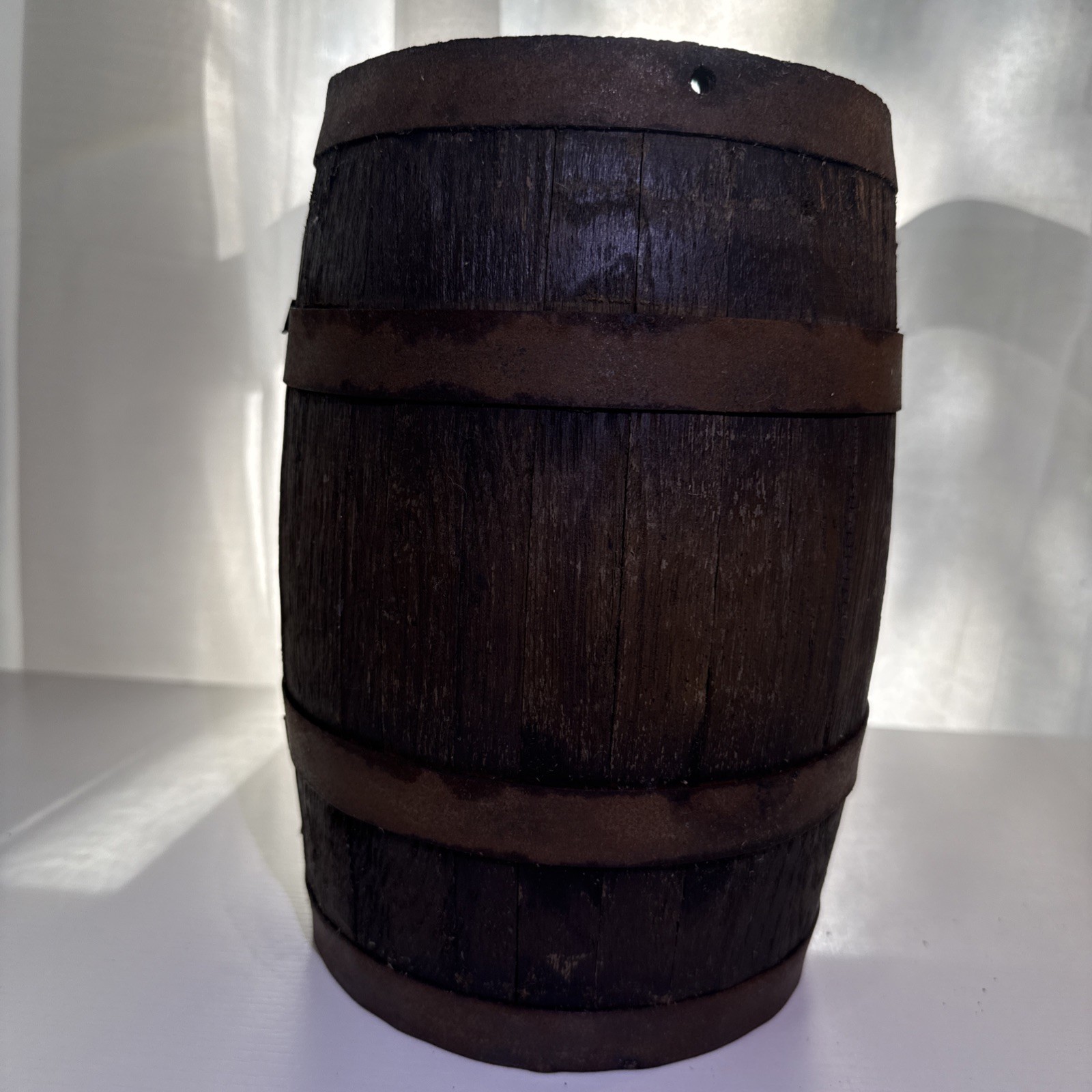 Antique Rustic Wood Barrel Made of Oak with Dark Metal Bands.