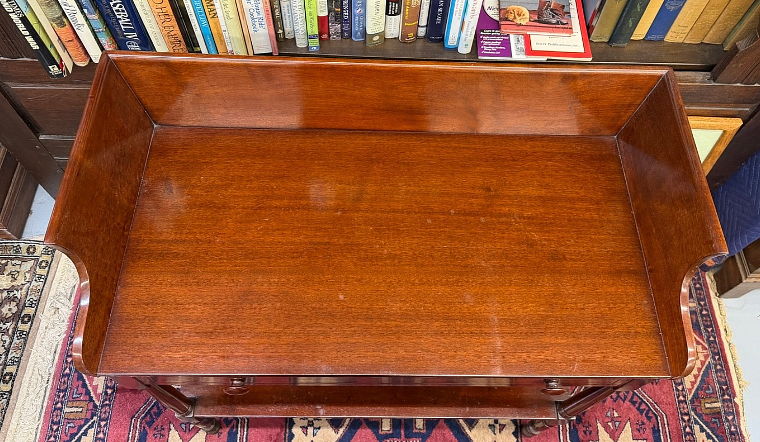 Mahogany side table with canted top rails, American, 1850s, French polish