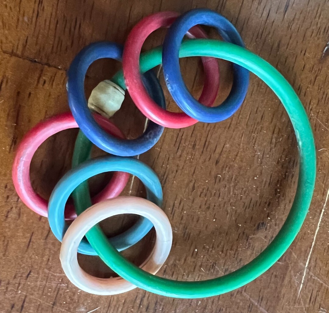 Antique Celluloid Teething RingRattle Red, Green, Blue, White Rings. Great Shape