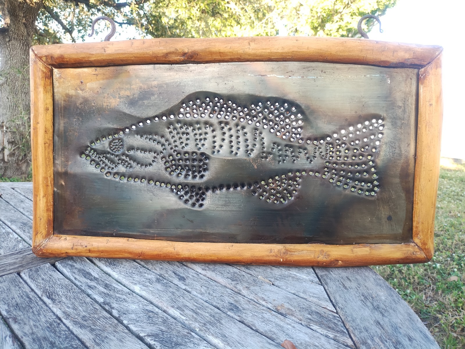 LARGE PRIMITIVE VINTAGE HAND MADE PUNCHED TIN FISH WITH LIVE EDGE WOOD FRAME