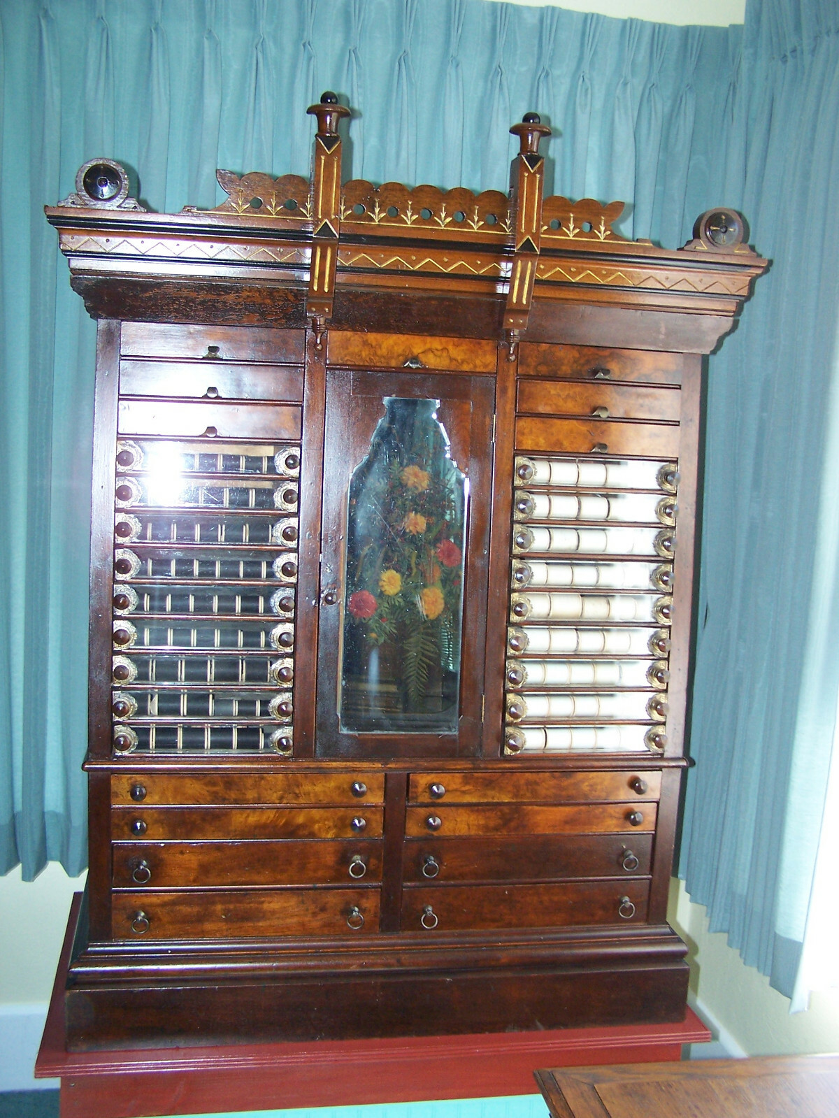 ANTIQUE WALNUT SPOOL CABINET