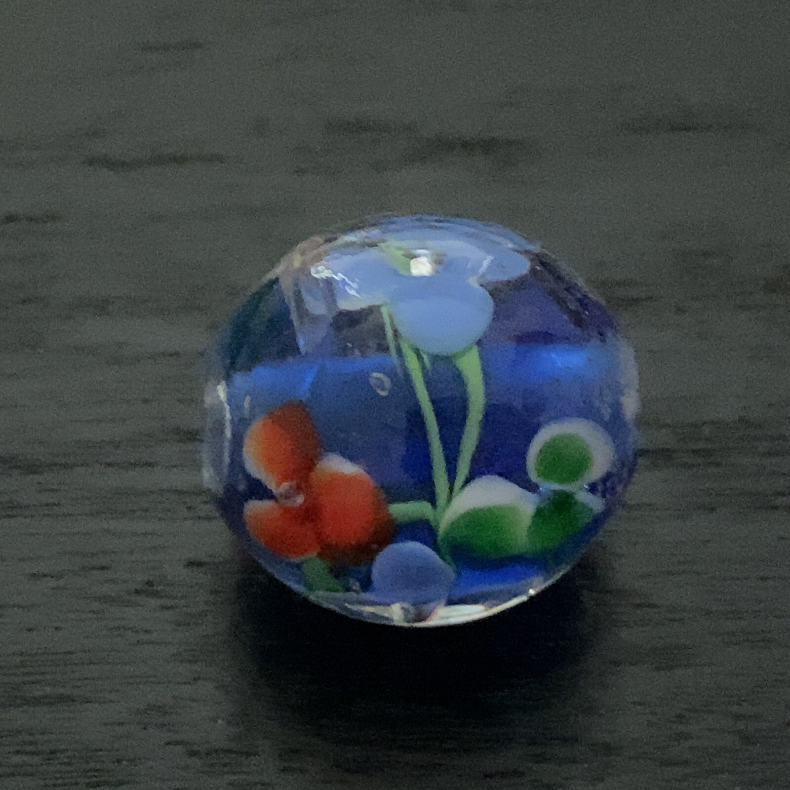 APR-11 Japanese glass OJIME tombodama netsuke Flowers in a clear blue base